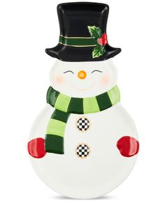 a glass snowman with a green scarf and hat