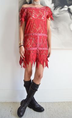 An absolutely incredible THIERRY MUGLER S/S 1980 red lace dress, which was seen on the runway. The piece does not have any material or size labels, otherwise it is in perfect condition especially considering its age. Please refer to the measurements below for more detailed information, it has been pictured here on a size 40 IT, 5 7" and fits well.  Measurements: Shoulder to Hem 36" Armpit to Armpit 16.5" Width of both button adorned straps 32" Fabric: No fabric label Please be aware that all items are vintage or second hand and therefore have been worn before (unless otherwise stated). Any discrepancies or particular issues will be noted and pictured. If you have any questions, do not hesitate to contact me. Red Vintage Lace Dress, Red Sheer Mini Dress, Red Sheer Mini Length Dress, Red Sleeveless Lace Dress For Summer, Red Mini Dress With Lace Trim For Party, Red Lace Trim Mini Dress For Party, Red Sleeveless Mini Dress With Lace Trim, Red Lace Dress With Lace Trim For Summer, Red Lace Dress With Lace Trim For Evening