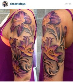 a woman's arm with flowers on it and the other half of her arm