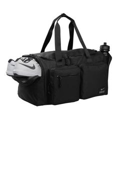 The Utility Duffel keeps your gear secure and ready to use while you’re working toward your next level of fitness. Multiple pockets organize training essentials, while several handles offer versatile carrying options. 100% polyester Zippered main compartment for spacious, secure storage Durable construction helps keep cargo safe when you’re on the move Adjustable shoulder strap and handles at the top and side offer comfortable carrying options Exterior zippered pockets keep small items close and organized Built-in ventilation lets gear breathe Dimensions: 22"l x 11"w x 12"h; Approx. 3,113 cubic inches Sporty Gym Bag For Sports, Sports Nylon Duffle Bag, Sporty Nylon Gym Bag, Sporty Nylon Duffle Bag For Sports, Nylon Duffle Bag With Functional Pockets For Gym, Sporty Black Gym Bag, Black Sporty Gym Bag, Sporty Gym Travel Bag, Black Sporty Gym Bag For Workout