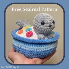 a crocheted sea animal in a blue bowl