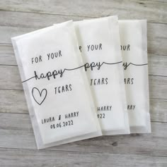 four personalized wedding napkins with the words for your happy years printed on them