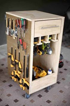 a tool cabinet with tools in it on the floor