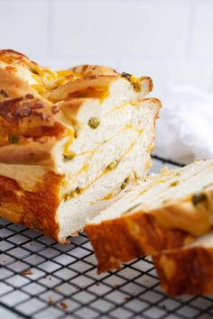 a loaf of bread sitting on top of a cooling rack