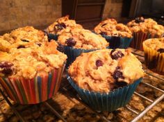 muffins cooling on a rack in a kitchen