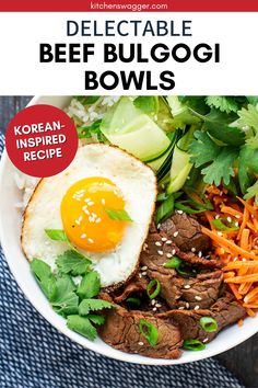 a bowl filled with beef, carrots and an egg on top of some rice