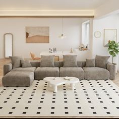 a living room filled with furniture and a large rug