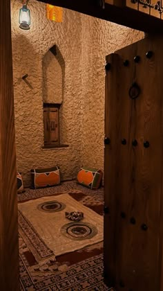 an open door leading into a room with decorative decorations on the walls and flooring