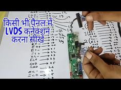 two hands are working on an electronic circuit board with wires in front of them and the words lvdd written below it