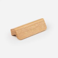 a wooden object on a white background