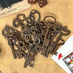 many old keys are laying on the table