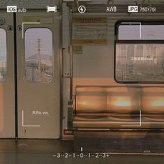 an empty subway car with its doors open and windows showing the different areas where it is located