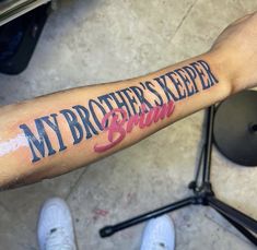 a man's arm with the words my brothers keeper written on it