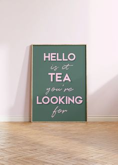 a green poster with the words hello is at tea you're looking for on it