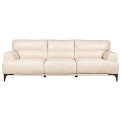 a white leather couch sitting on top of a wooden frame