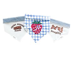 three bandanas with different designs on them, one blue and the other white that says betty's bite