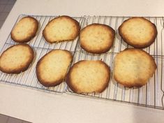 some cookies are cooling on a wire rack