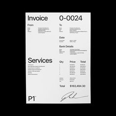 an invoice is shown on top of a piece of white paper with black writing