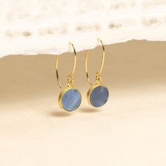 Statement Blue Opal Circle Drop earrings for her - 14k gold filled wire, Vermeil gold bezel - Unique elegant jewelry for her, mom, bff Stone: Genuine Blue Opal Bezel: Vermeil Gold Ear-wire: 14k Gold Filled Total length of earring: 35mm Circle Gemstone: 12mm diameter About "Gold Filled Jewelry": Also called rolled-gold. These jewelry items are not actually filled with gold. They are made of a base metal covered by sheets of gold in a mechanical bonding process. Effectively a thick coat of gold: the industry standard for the gold content is 5% or 1/20 of the total weight. Made with 14k gold, it is hard wearing. With reasonable care it will not peel or flake, and should last as long as solid 14k gold jewelry. It is safe for most people with sensitive skin. With gold-filled jewelry, the proces Thick Coat, Girly Stuff, Opal Earrings, Jewelry For Her, Cornflower Blue, Treasure Chest, Blue Earrings, Gold Filled Jewelry, Blue Opal