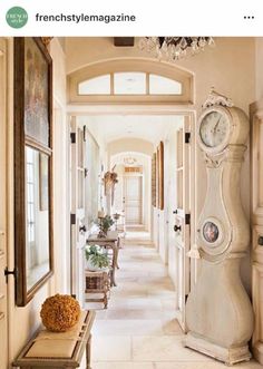 a hallway with a clock on the wall