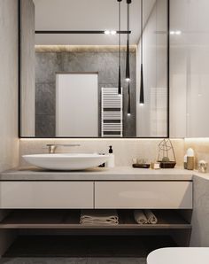 a bathroom with a sink, mirror and towel rack in it's center area