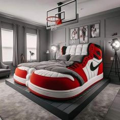 a bedroom with a bed made to look like a sneaker shoe in grey and red