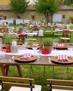 a table set up for an outdoor dinner