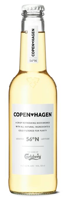 a bottle of alcohol that is on a white background with the words openvhagen