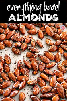 almonds on a baking sheet with the words everything badel almonds above them