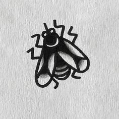 a black and white drawing of a bug