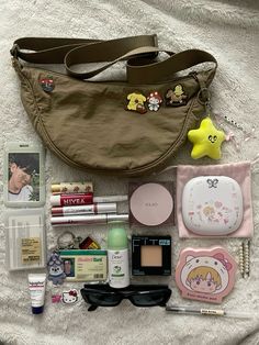 kpop, sanrio, makeup purse Decorated Bags Ideas, Aesthetic Crossbody Bag, Kpop Sanrio, Uniqlo Bag, Capacious Bag, Sanrio Makeup, Backpack Aesthetic, Everyday Bag Essentials, Uni Bag