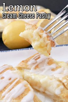 lemon cream cheese pastry on a plate with a fork