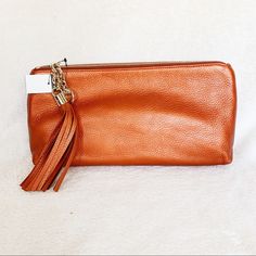 Gorgeous, An Excellent Clutch That Is Practical And Chic, With A One Of A Kind Look, From Gucci! Crafted Of Pebbled Calfskin Leather Metallic Orange. Tassels And Horsebit Fob With Polished Gold Hardware Top Zipper Orange Fabric Interior With A Patch Pocket. Measurements Approximately Length: 12 In; Height: 6 In; Width: 2 In Chic Gucci Leather Clutch, Gucci Leather Rectangular Clutch, Chic Gucci Clutch For Evening, Elegant Gucci Leather Clutch, Gucci Chic Evening Clutch, Chic Orange Clutch, Metallic Orange, Orange Fabric, Gold Orange