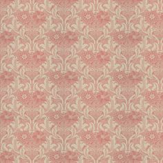 an old fashioned wallpaper pattern in pink and white