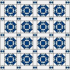 a blue and white quilt with squares on it