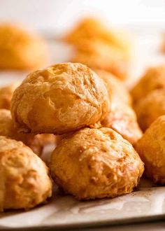 some biscuits are stacked on top of each other and ready to be eaten by someone