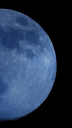 an airplane flying in front of the moon