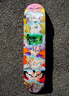 a skateboard with the image of dragon ball characters painted on it's side