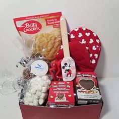 a valentine's day gift box filled with treats