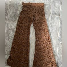 From Hemline Nwt Crochet Pants With Shorts Lining. There Is No Label Of Size But They Fit Like A Small. Elastic Waist With Some Stretch. Great Looking Pants For Fall. Sexy!!! Fall Stretch Lace Bottoms, Stretch Lace Bottoms For Fall, Fall Lace Stretch Bottoms, Lace Stretch Bottoms For Fall, Stretch Lace Wide-leg Pants, Casual Lace Wide Leg Bottoms, Spring Stretch Brown Pants, Brown Stretch Pants For Spring, Spring Full Length Lace Bottoms