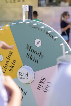 A spin wheel with skin care related topics Spin The Wheel Design, Engagement Games, Prize Wheel, Popup Store, Spin The Wheel, Point Of Sale Display, Event Booth, Interactive Experience, Board Game Design