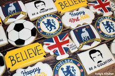 decorated cookies are arranged in the shape of england's crests and soccer balls