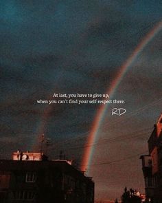 a rainbow in the sky with a quote on it