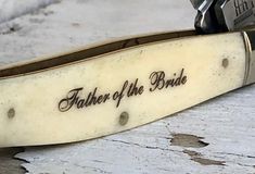 a knife with the words father of the bride written on it