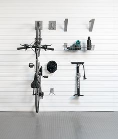 there is a bike hanging on the wall