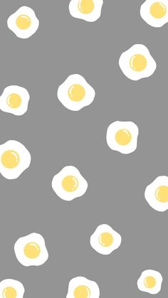 an image of fried eggs on a gray background with white outlines in the middle