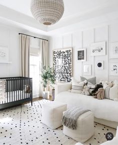 an instagramted photo of a white living room with black and white flooring