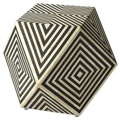 a black and white geometrically designed object