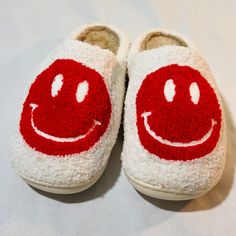 These cozy and colorful slip-on slippers are perfect for any casual occasion. Featuring a round toe shape and a standard shoe width, they are designed to fit comfortably on women's feet in US size 6.5 and AU/UK size 7.5. The upper material is made of soft fabric with a smiley face/happy face pattern, and the lining material is faux fur, making them ideal for winter, fall, and spring seasons. The outsole is made of rubber, providing slip resistance and stability, and the insole is cushioned with faux fur for extra comfort. These lightweight slippers are non-slip and easy to wear, making them a great addition to any wardrobe. They are not handmade, but they are customized with a colorful and cheerful theme that will brighten up your day. Sniley Face Slippers, Red Smiley Face Slippers, Pink Smiley Face Slippers, Bur Basket, Yellow Smiley Face Slippers, Smiley Face Slippers, Burr Basket, Plush Slippers, Face Pattern