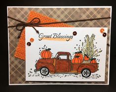 a card with an orange truck and pumpkins